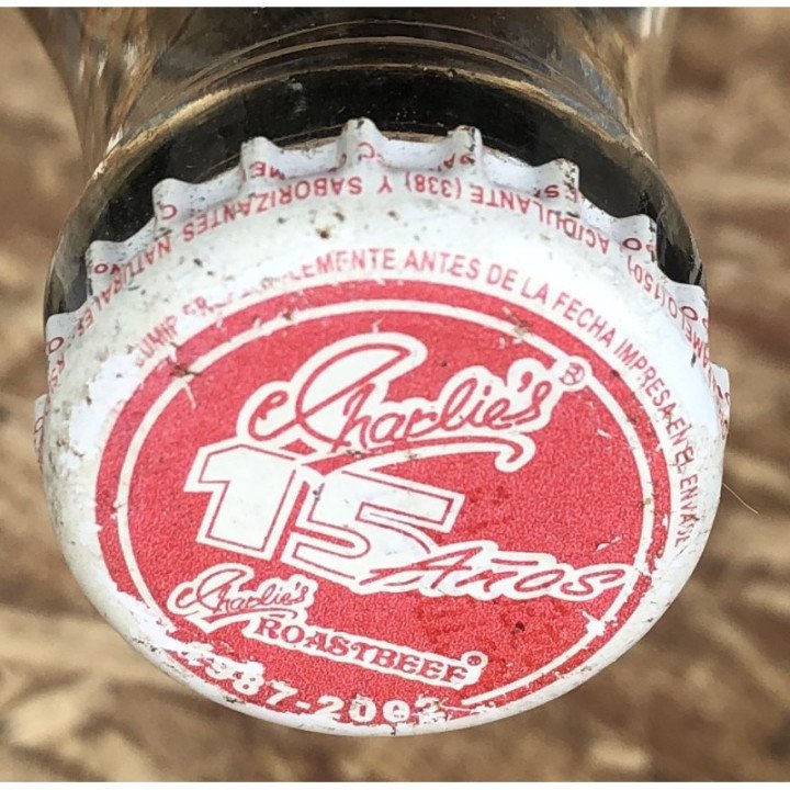 Botella 237ml 15 Años Charlie's Roastbeef - Colombia 2002 reverso
