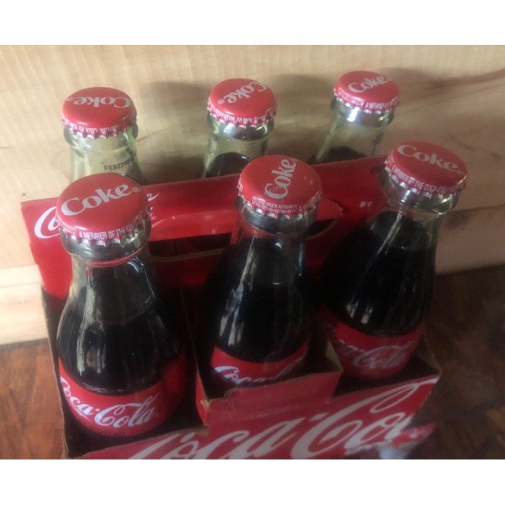 Canasta Coca-Cola 237 ML Six Pack - Usa 2010 reverso